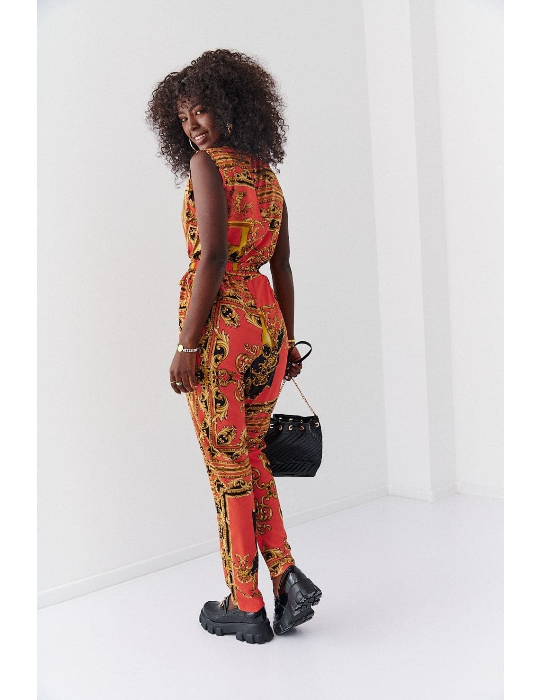 Patterned jumpsuit with envelope neckline, orange and mustard 70000 - Online store - Boutique